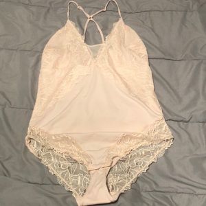 Pink (blush) body suit